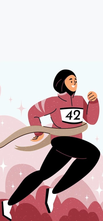 A runner breaking the finish tape