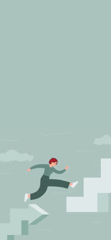 A person taking the next step up a flight of stairs