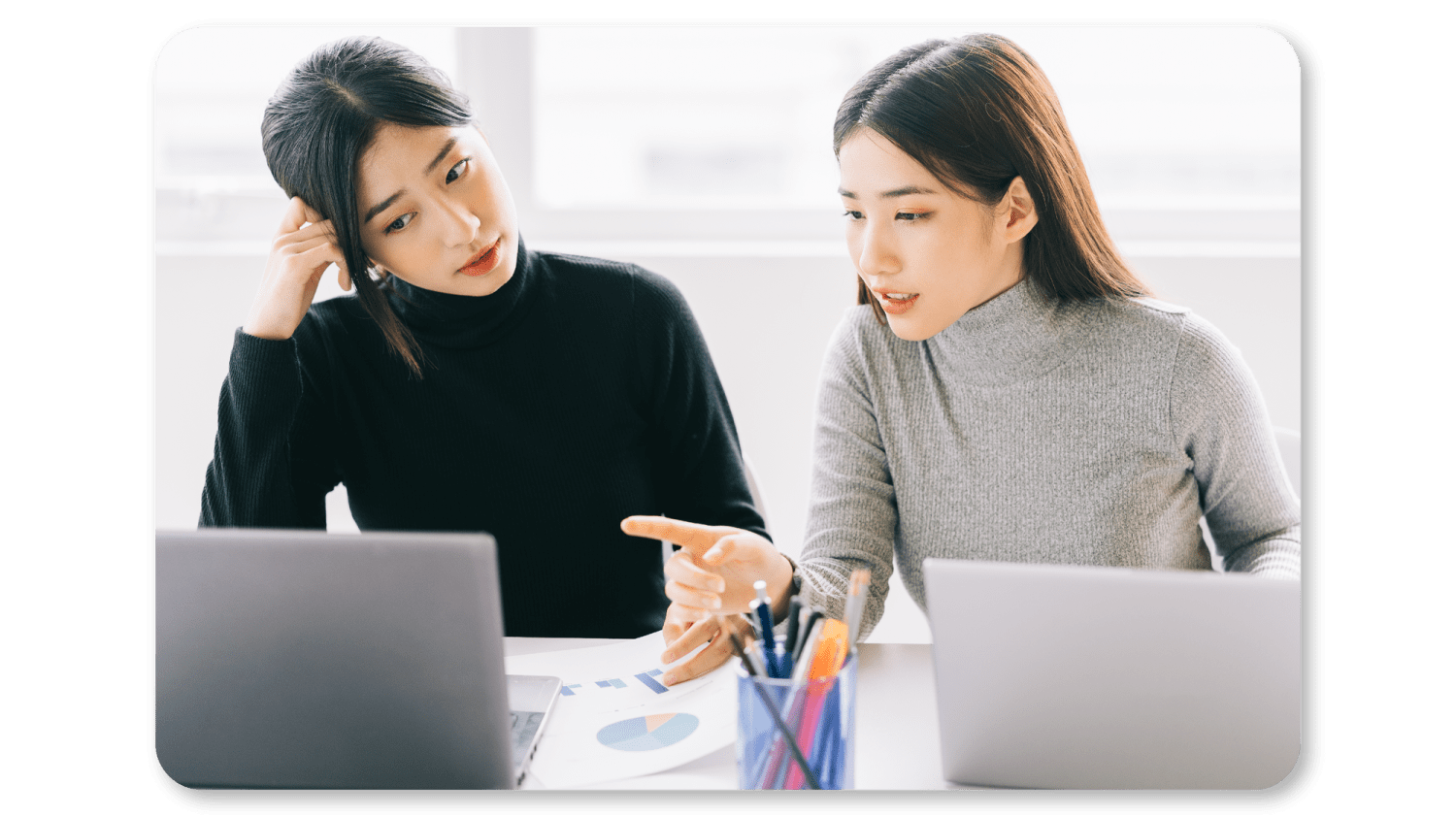 A mindful employee is assisting another employee in problem solving which in turn will benefit the employer