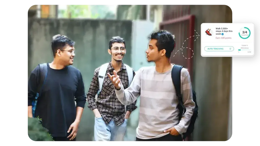 Three young men walking and chatting outdoors with a Vantage Fit step challenge progress widget overlay
