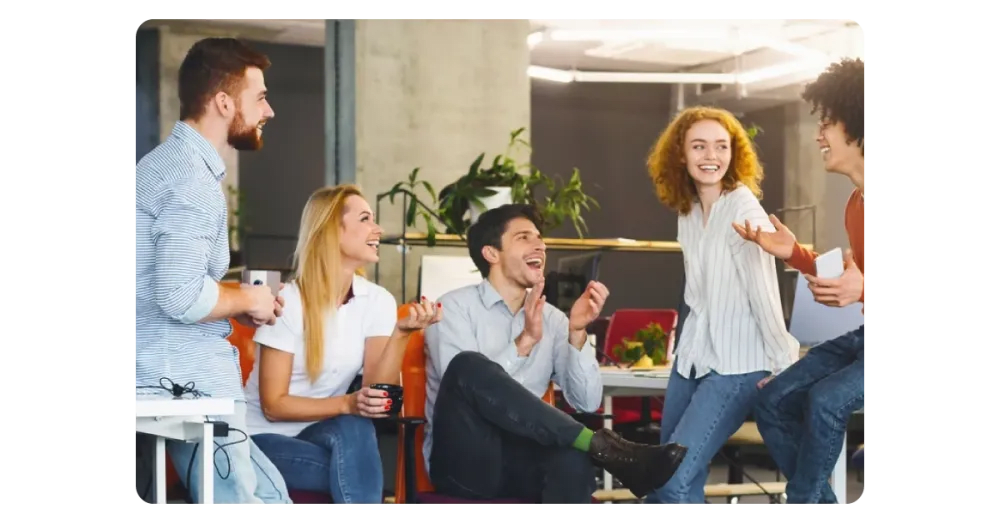 Employees in a positive work environment participating in wellness activities