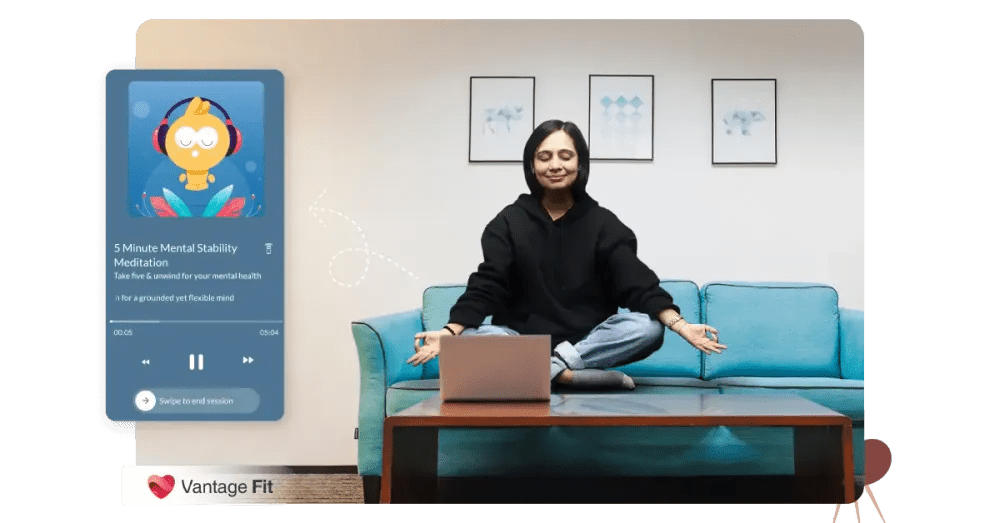 Employees practicing mindfulness meditation at work as part of a mental wellness initiative