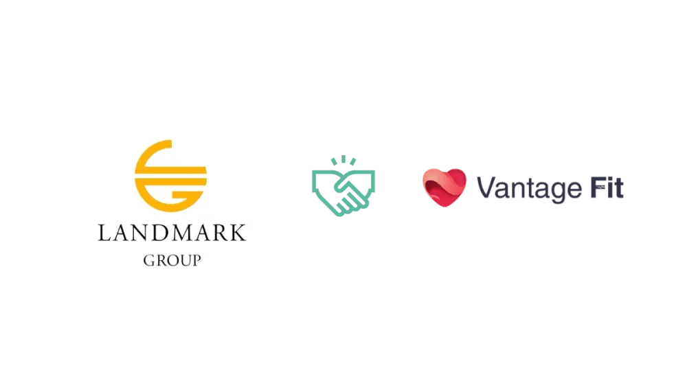 The logos of Landmark Group, Vantage Fit, and a handshake, representing a partnership in the context of wellness programs.