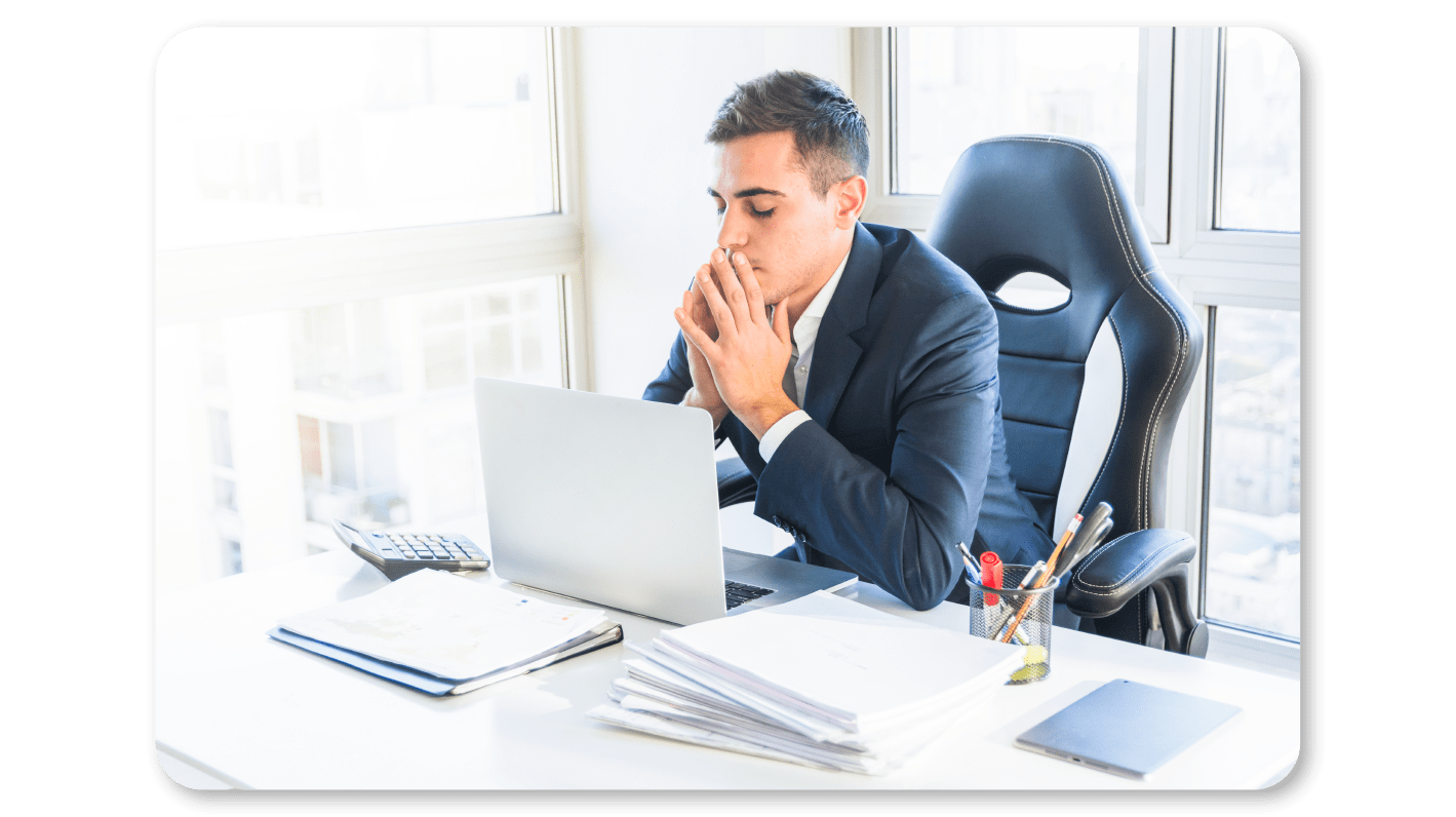 A Man Practicing Mindfulness Exercises at Work through Mindful Visualization