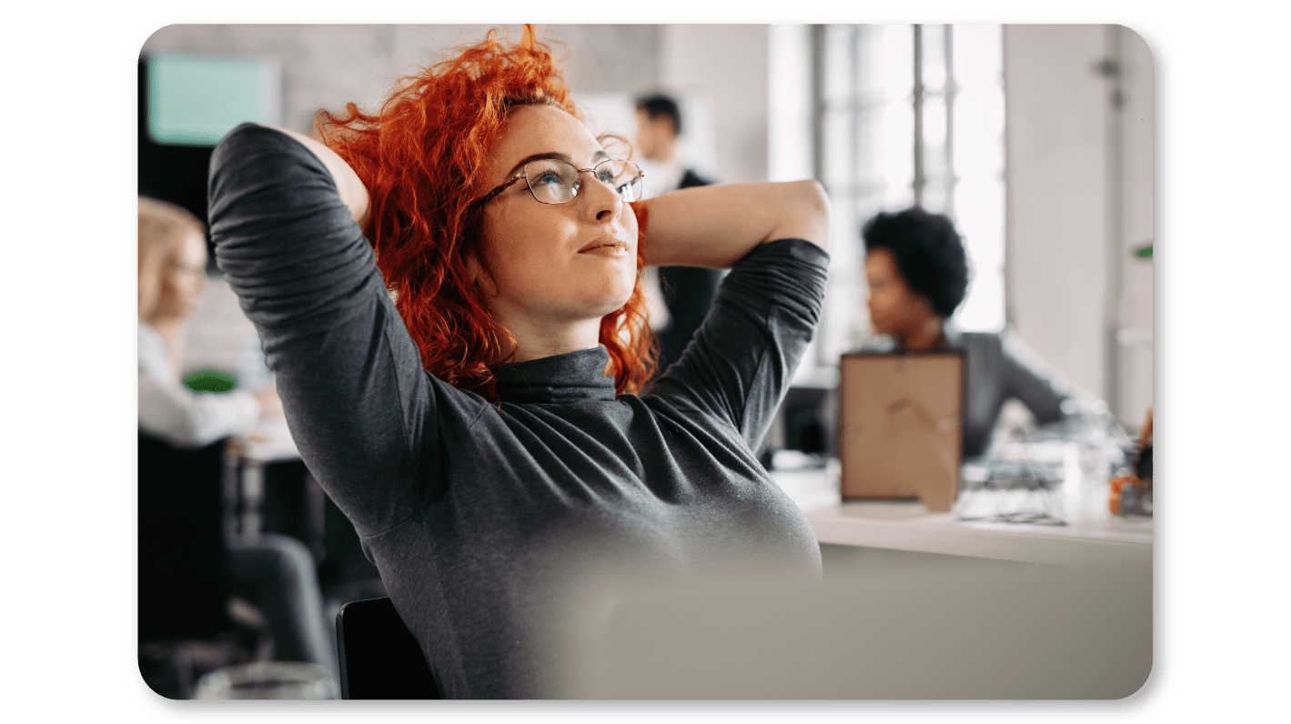 A Woman Practicing Mindfulness Exercises at Work through Mindfully Pausing and Accepting her Reality