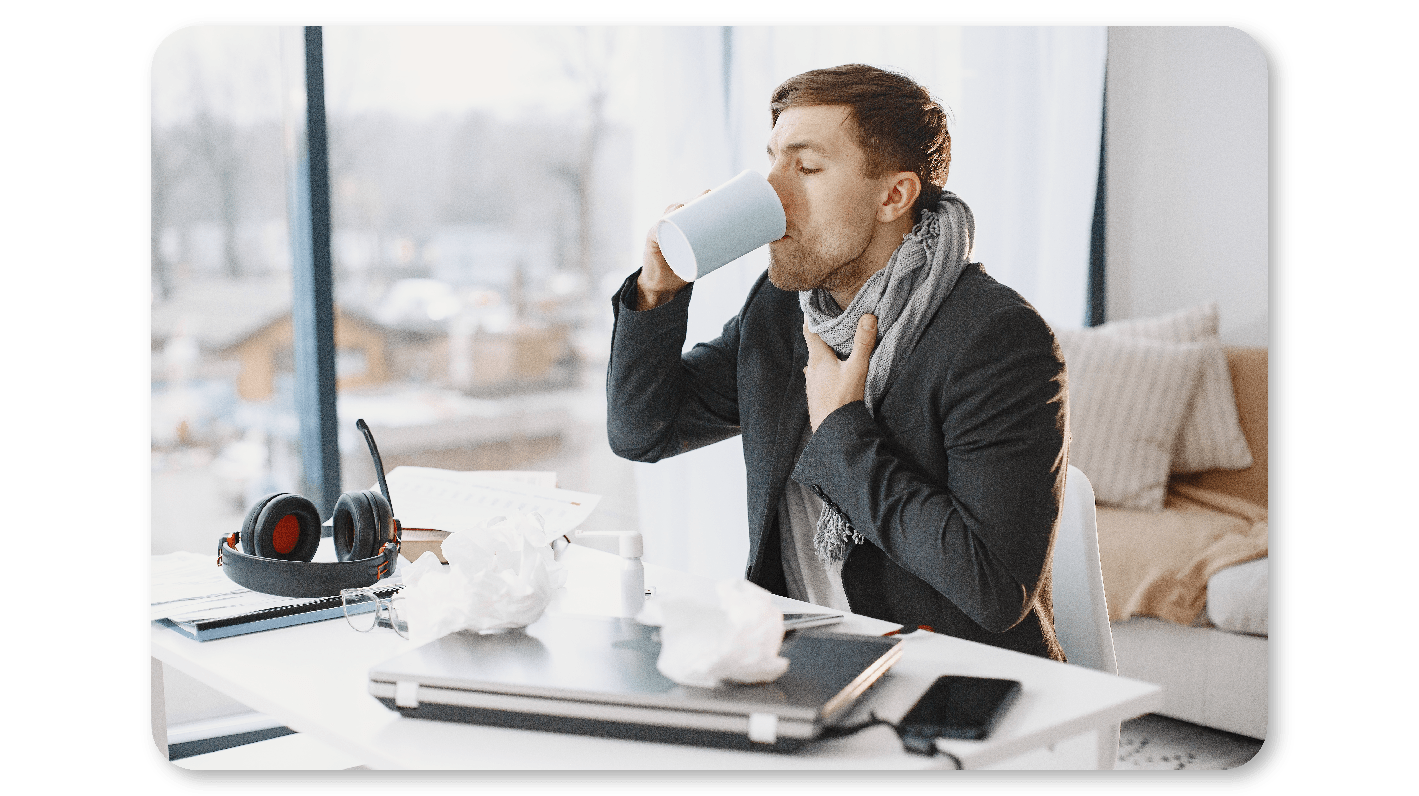 Employee suffering from viral infection taking hot drink