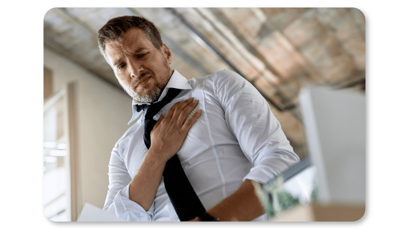 Young employee experiencing chest pain due at work