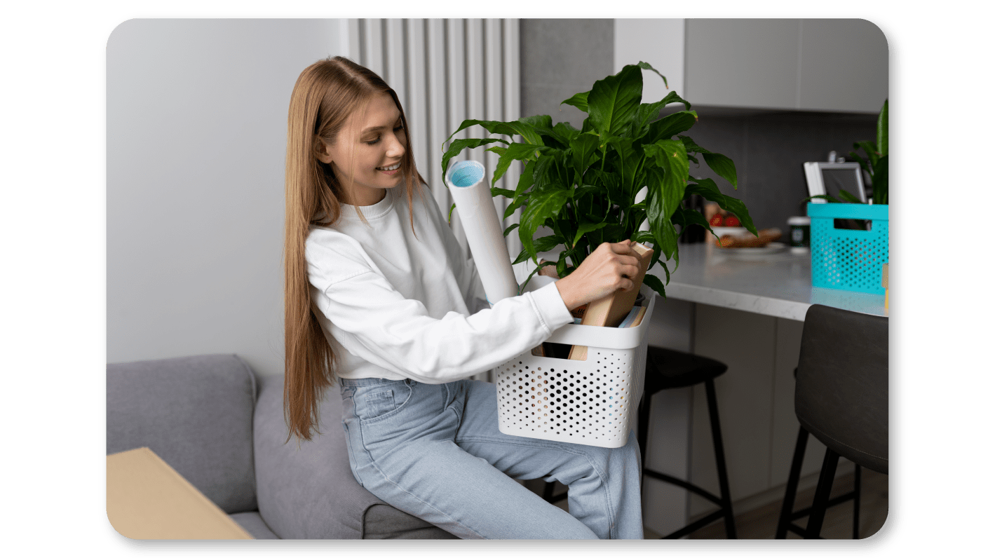 An Employee Practices Self Care At Work by Decorating Her Workspace