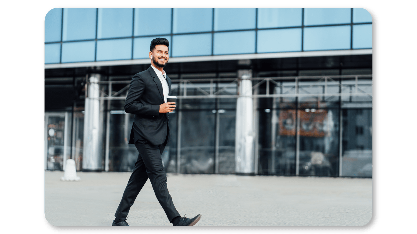 An Employee Practices Self Care At Work by Taking Walking and Stretching Breaks