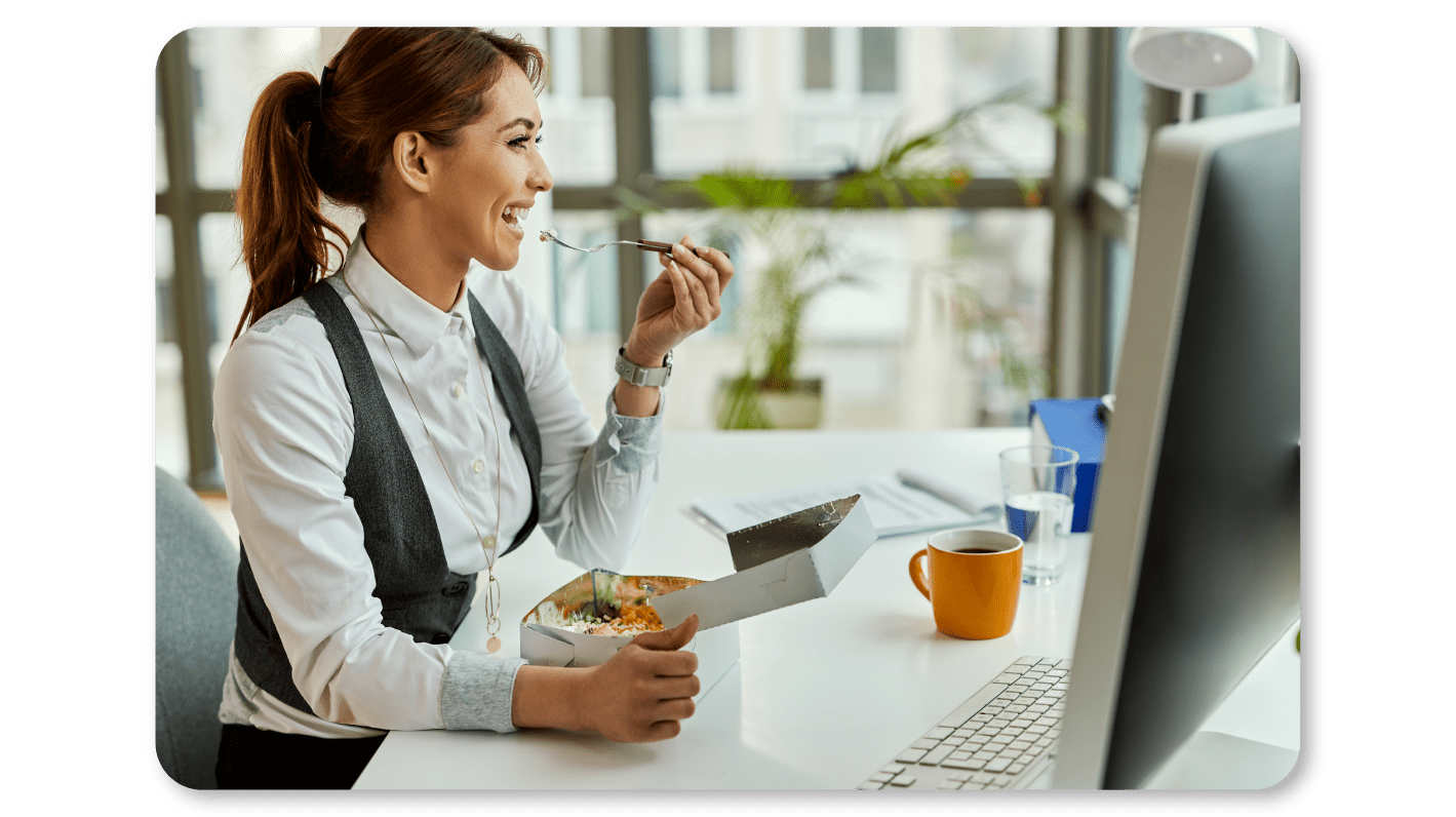 An Employee Practices Self Care At Work by Eating a Balanced Diet