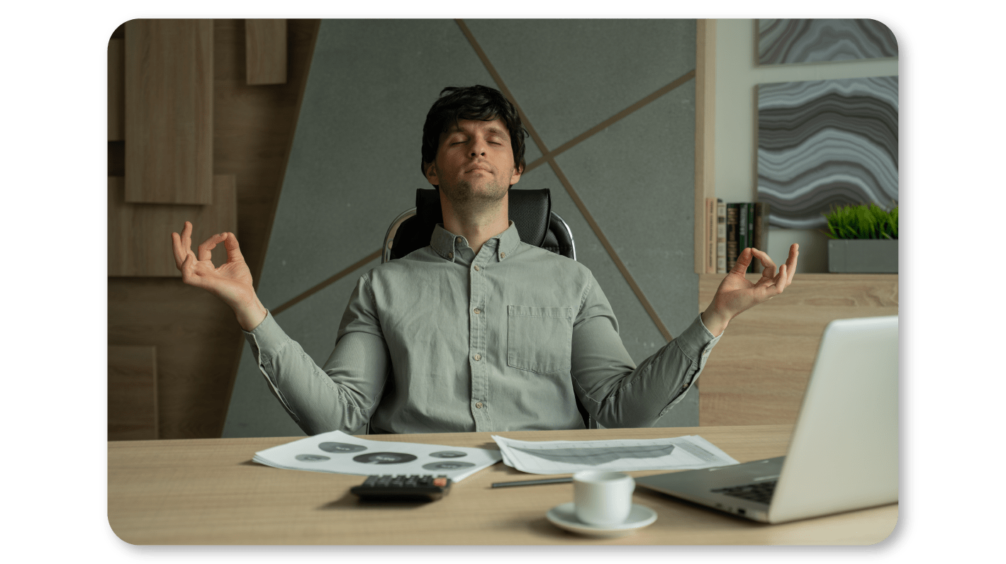 An Employee Practices Self Care At Work by Practicing Mindfulness