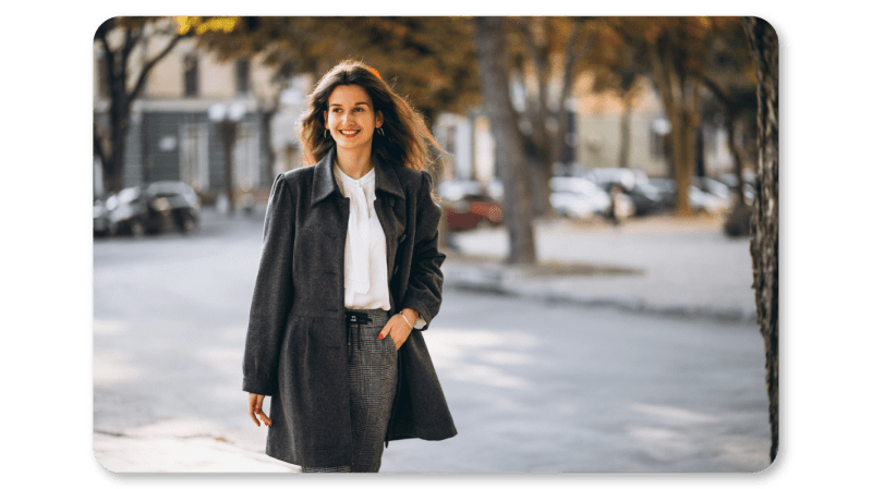 A woman practicing walking meditation on a short break away from her desk