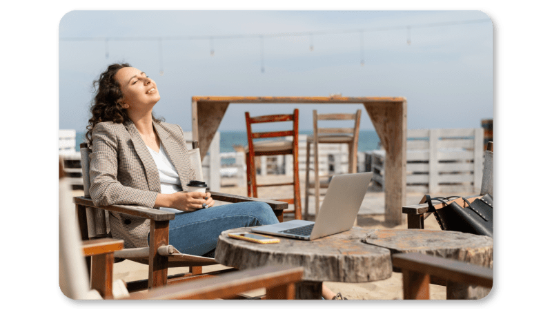 A Woman Practicing Mindfulness Exercise at Work through Mindful Exploration of the Five Senses