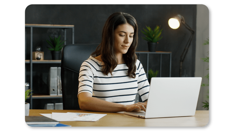 A Woman Practicing Mindfulness Exercises at Work through Mindful Immersion