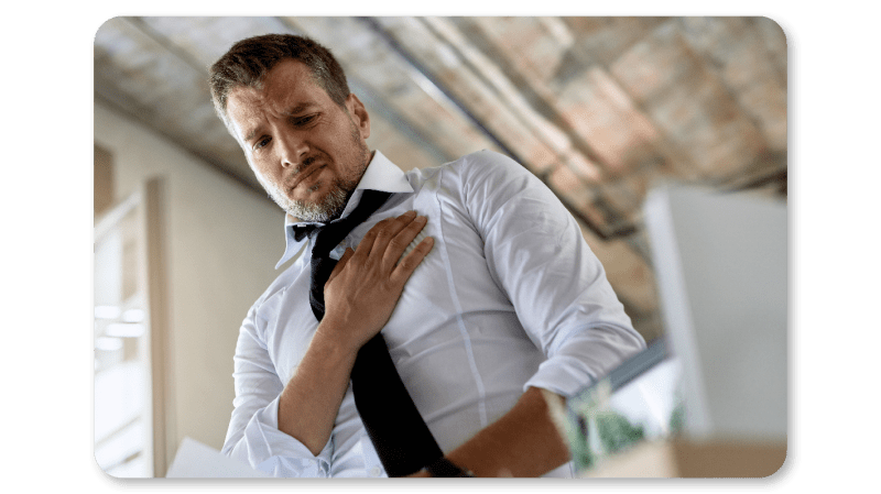 Young employee experiencing chest pain due at work
