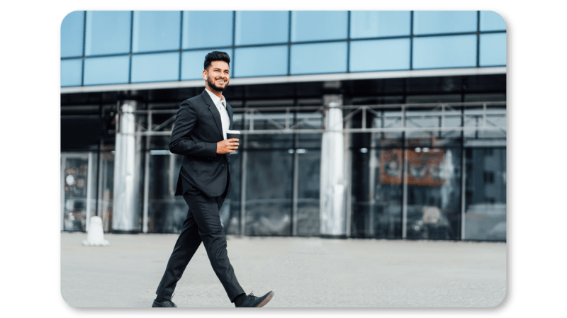 An Employee Practices Self Care At Work by Taking Walking and Stretching Breaks