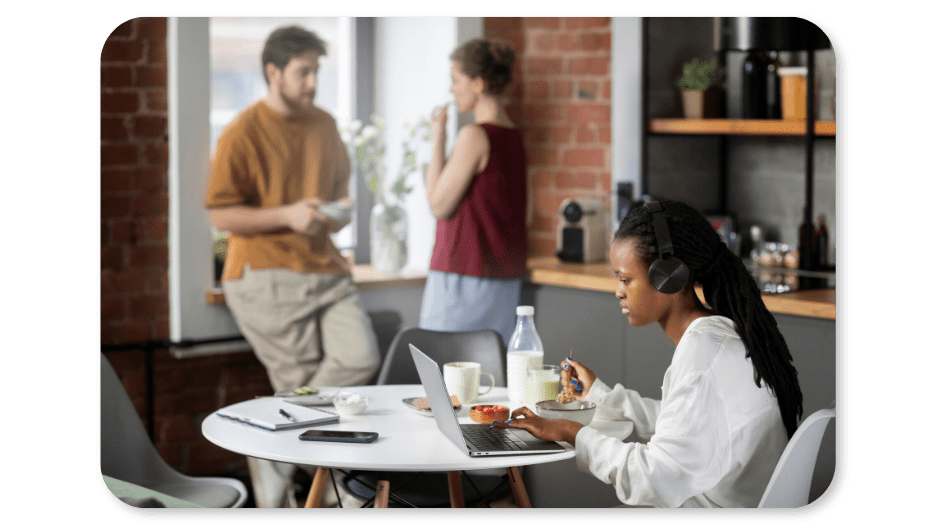 An employee watches a netflix series and has food to recover from stress