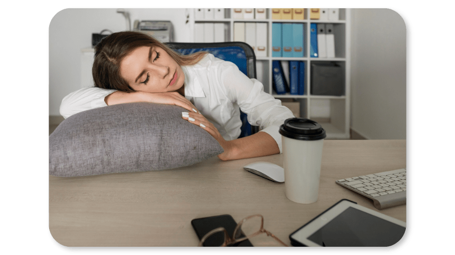 An employee harnesses the power of micro-breaks at work by taking a good restful nap