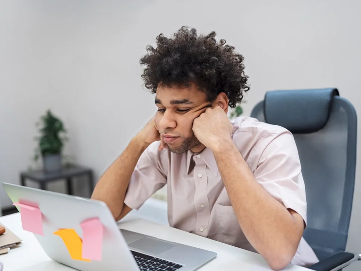 Frustrated employee at desk